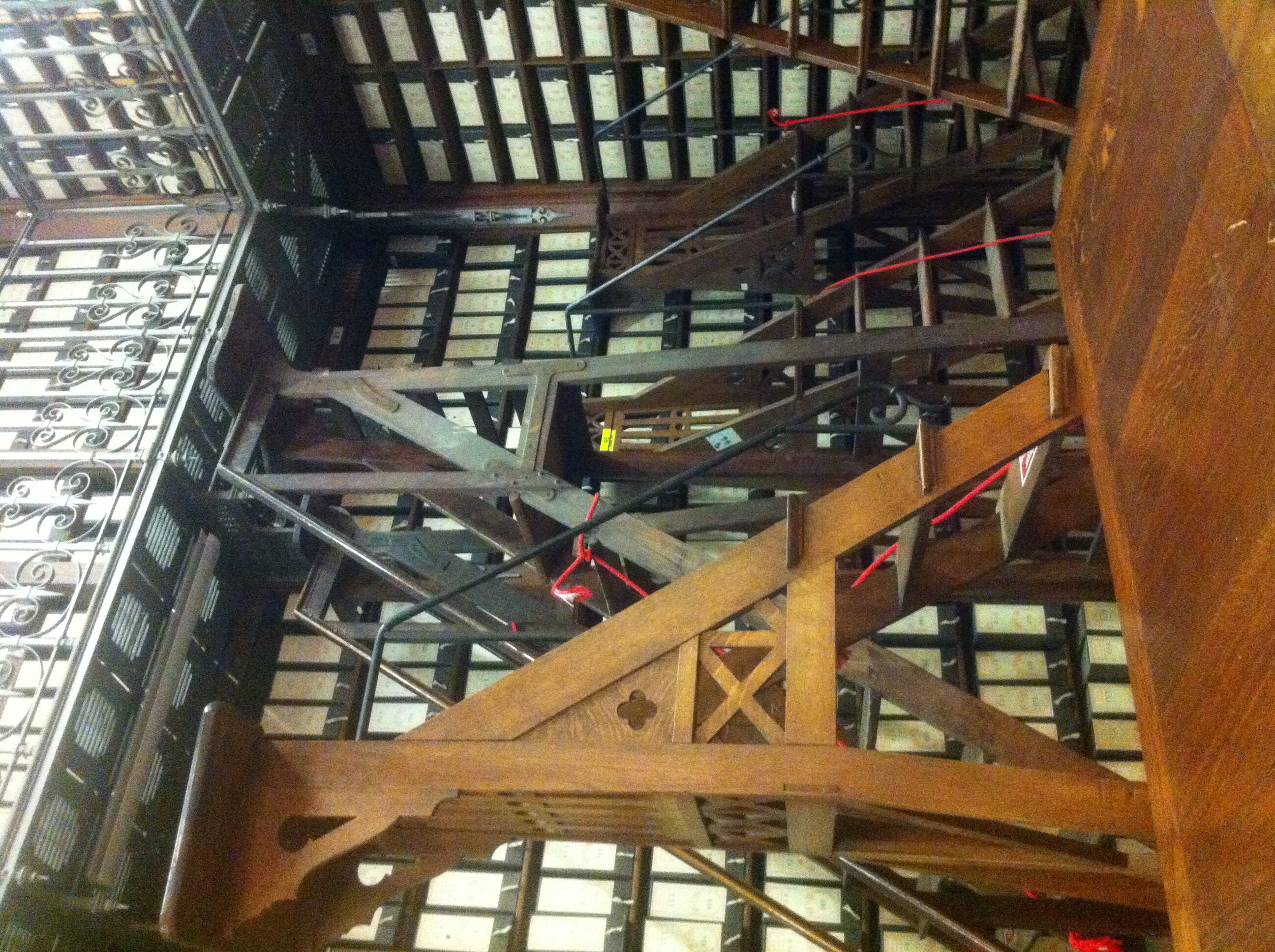 Tall shelves of archival boxes and a ladder at the Archives nationales in Paris, photographed in 2014.